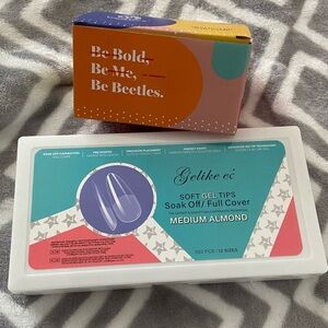 Almond nail tips (medium length) and Mini UV lamp